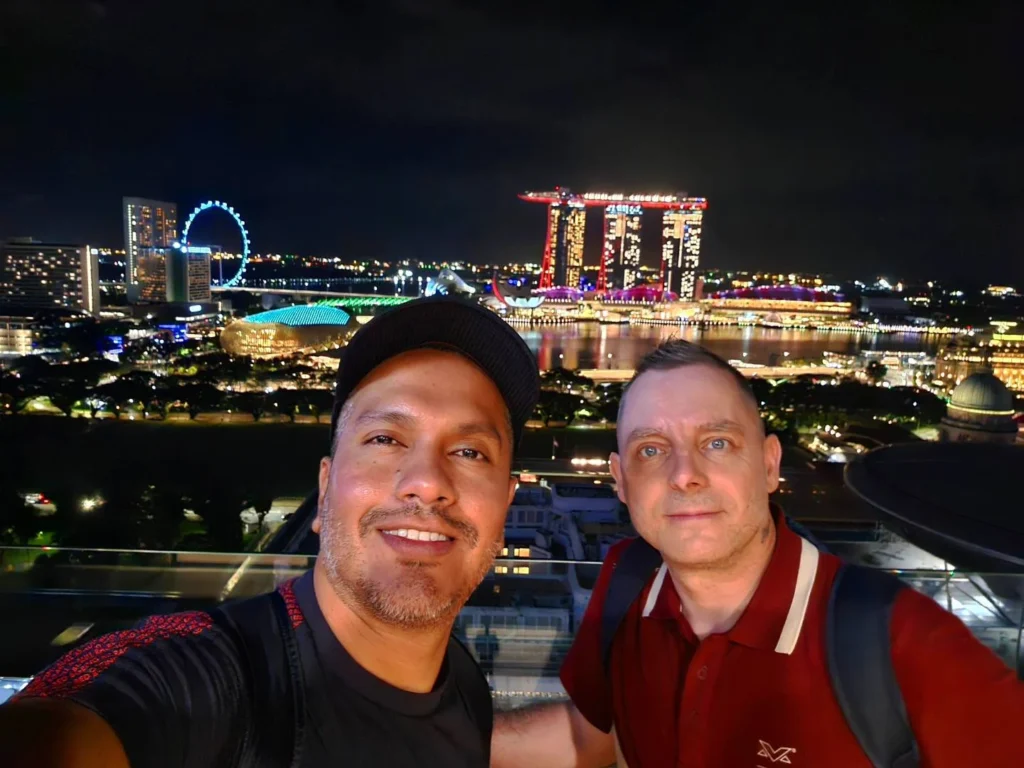 Cruising with Danny and Peter, Holland America Line, Westerdam, Singapore | View of Singapore's skyline from the Singapore Flyer during a spectacular adventure, showcasing iconic landmarks and vibrant cityscapes.