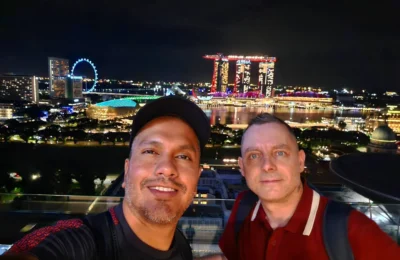 Cruising with Danny and Peter, Holland America Line, Westerdam, Singapore | View of Singapore's skyline from the Singapore Flyer during a spectacular adventure, showcasing iconic landmarks and vibrant cityscapes.