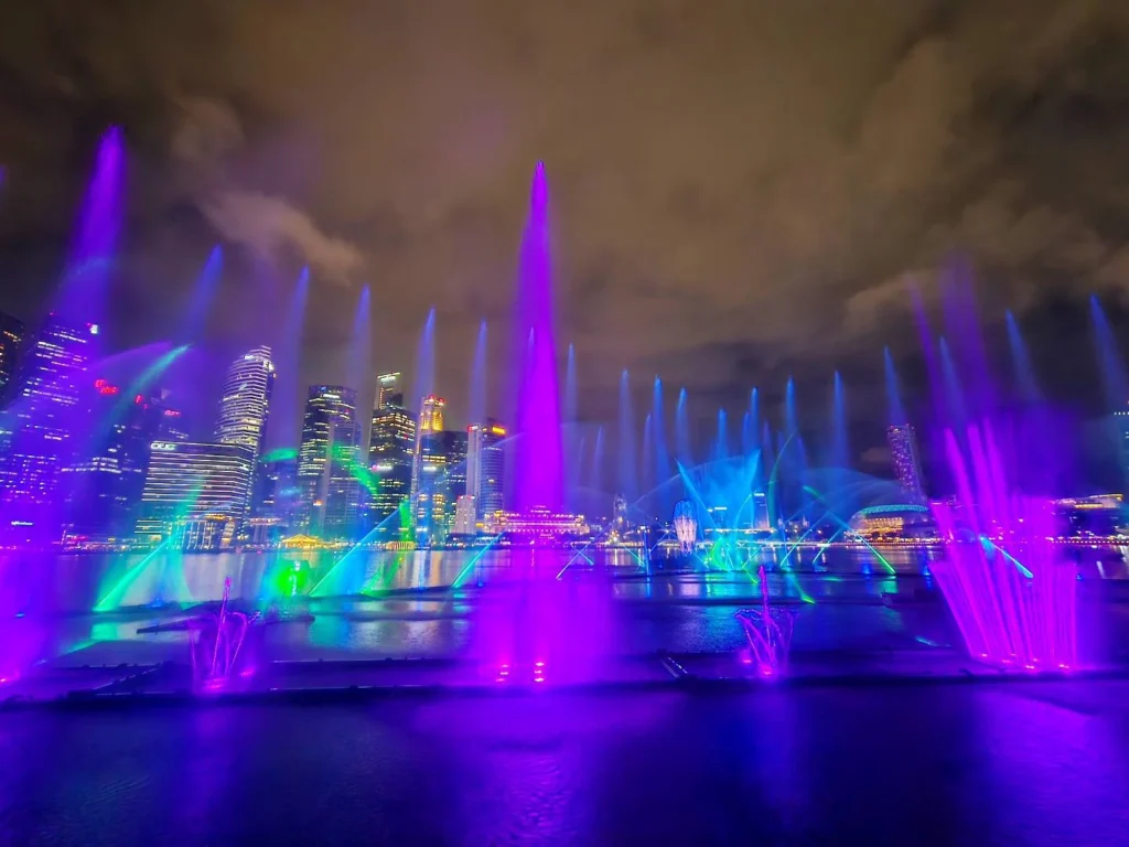 Cruising with Danny and Peter, Holland America Line, Westerdam, Singapore | View of Singapore's skyline from the Singapore Flyer during a spectacular adventure, showcasing iconic landmarks and vibrant cityscapes.