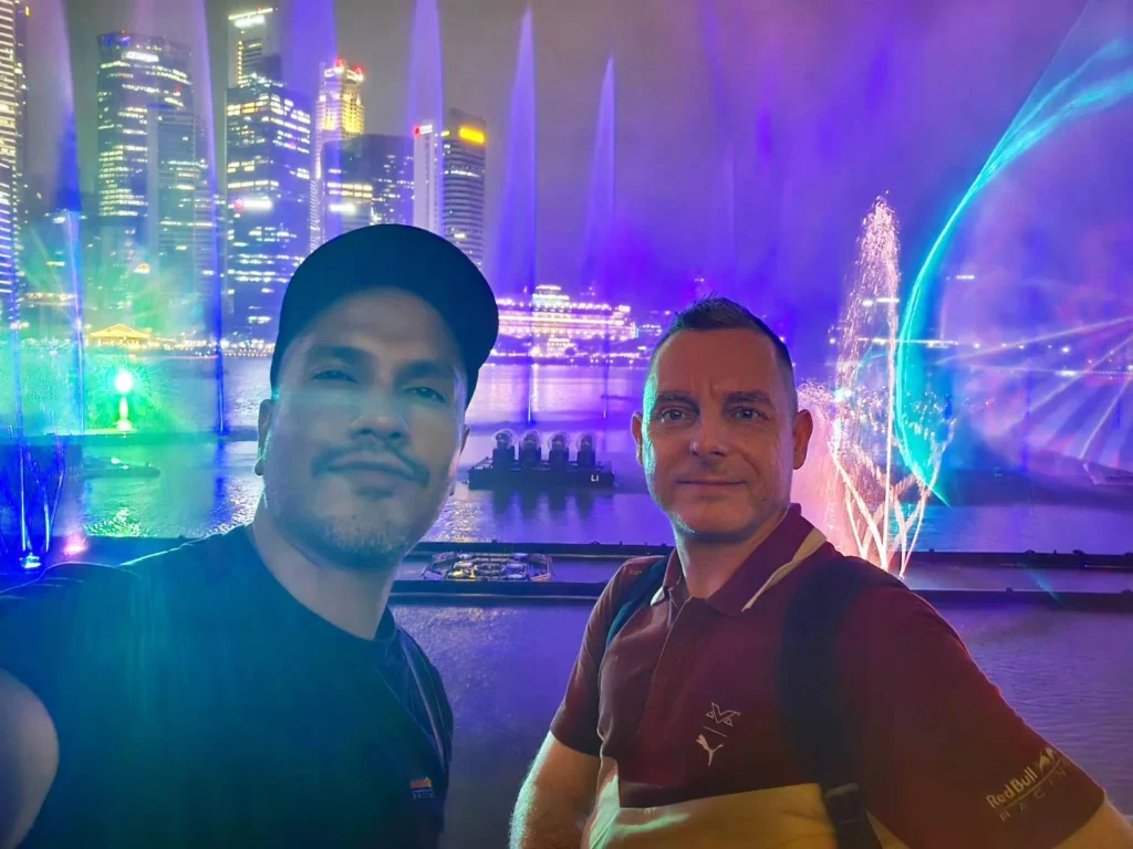 Cruising with Danny and Peter, Holland America Line, Westerdam, Singapore | View of Singapore's skyline from the Singapore Flyer during a spectacular adventure, showcasing iconic landmarks and vibrant cityscapes.