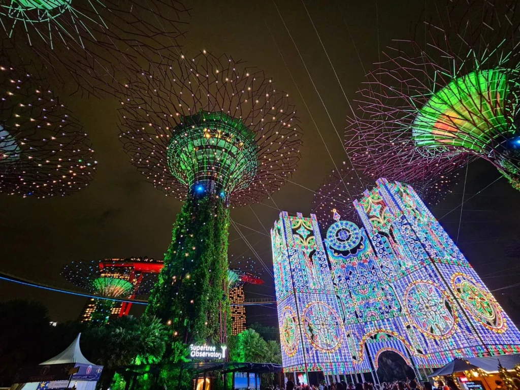 Cruising with Danny and Peter, Holland America Line, Westerdam, Singapore | View of Singapore's skyline from the Singapore Flyer during a spectacular adventure, showcasing iconic landmarks and vibrant cityscapes.
