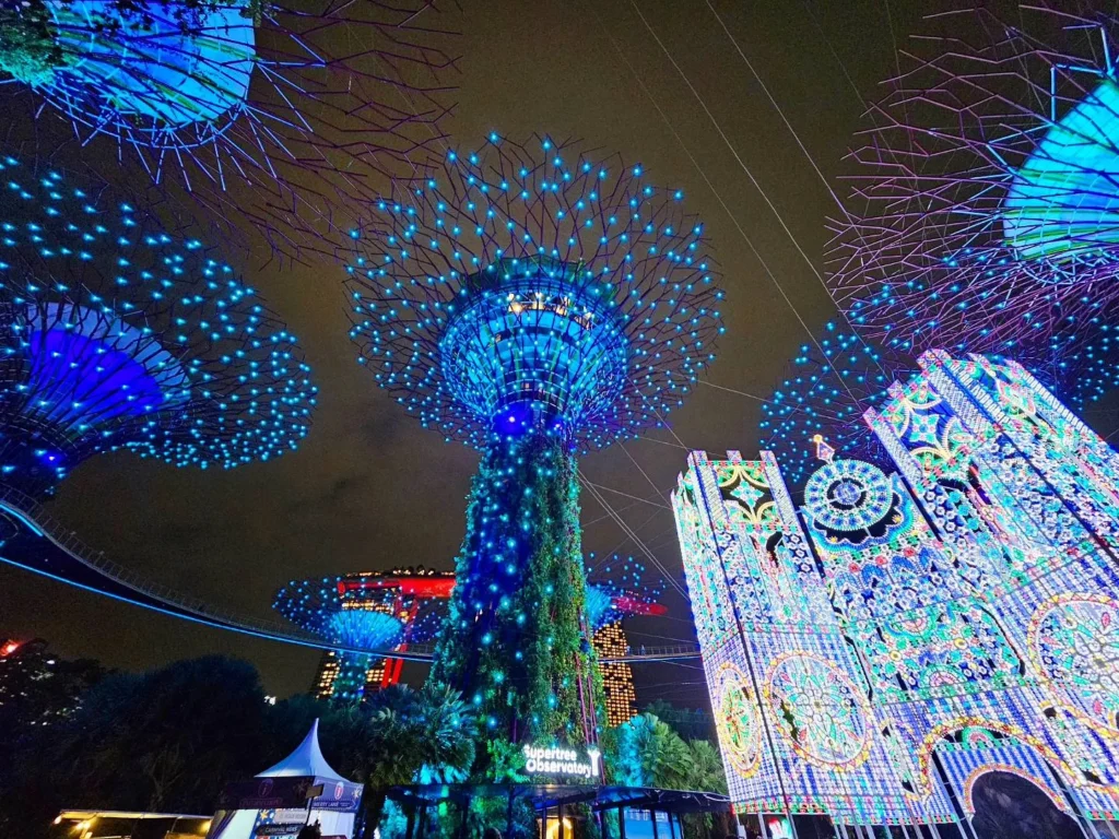 Cruising with Danny and Peter, Holland America Line, Westerdam, Singapore | View of Singapore's skyline from the Singapore Flyer during a spectacular adventure, showcasing iconic landmarks and vibrant cityscapes.