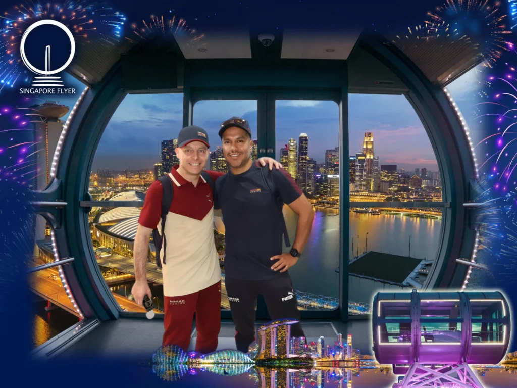 Cruising with Danny and Peter, Holland America Line, Westerdam, Singapore | View of Singapore's skyline from the Singapore Flyer during a spectacular adventure, showcasing iconic landmarks and vibrant cityscapes.