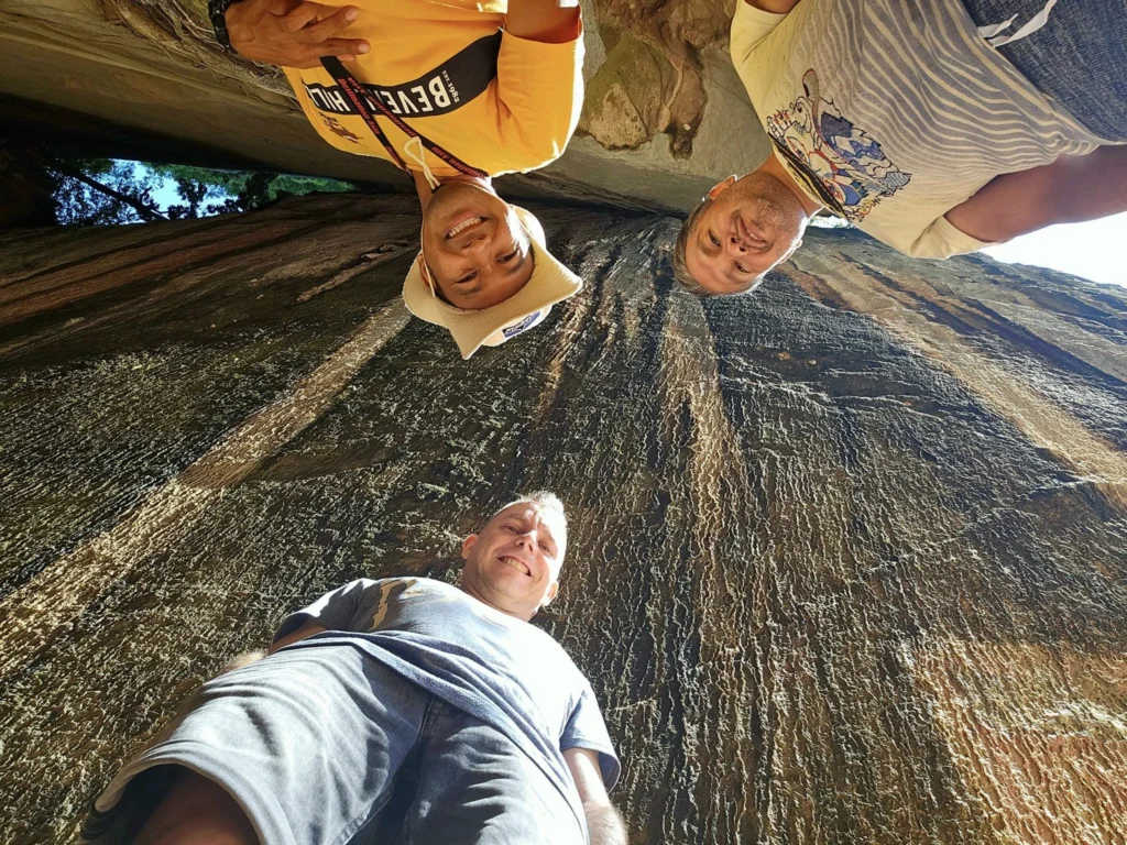 Cruising with Danny and Peter, Holland America Line, Westerdam, Phuket, Thailand | Longtail boat navigating clear waters near James Bond Island, showcasing iconic limestone cliffs. Enjoy dining at a floating restaurant on Phang Nga Bay, kayaking through lush mangroves, and exploring hidden caves with unique rock formations during an unforgettable Phuket island tour.