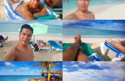 Cruising with Danny and Peter, Holland America Line, Nieuw Amsterdam, Grand Turk, Turks And Caicos | A stunning view of Bajari Beach in Grand Turk, showcasing the pristine shoreline and turquoise waters. Sunbathers relax under palm trees, while families enjoy beach picnics and vibrant snorkeling activities in the crystal-clear sea, capturing the essence of a perfect Caribbean getaway.