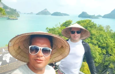Cruising with Danny and Peter, Holland America Line, Westerdam, Nathon, Koh Samui, Thailand | Breathtaking panoramic views of Ang Thong National Marine Park showcasing emerald lagoons and dramatic limestone formations, featuring secluded beaches and vibrant tropical landscapes, highlighting the adventure of exploring hidden coves and the essence of eco-tourism in this stunning marine conservation area.