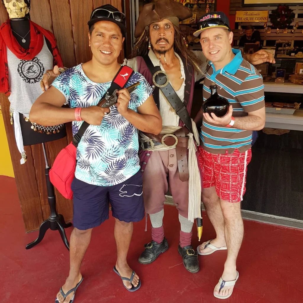 Cruising with Danny and Peter, Holland America Line, Nieuw Amsterdam, Saint Thomas, United States Virgin Islands | An adventurous scene capturing the essence of a St. Thomas adventure with vibrant images of kayaking along the pristine coastline, snorkeling amidst colorful coral reefs, and hiking on lush island trails. The images showcase the breathtaking natural beauty of the US Virgin Islands, highlighting the outdoor activities and eco-tourism experiences available in St. Thomas.