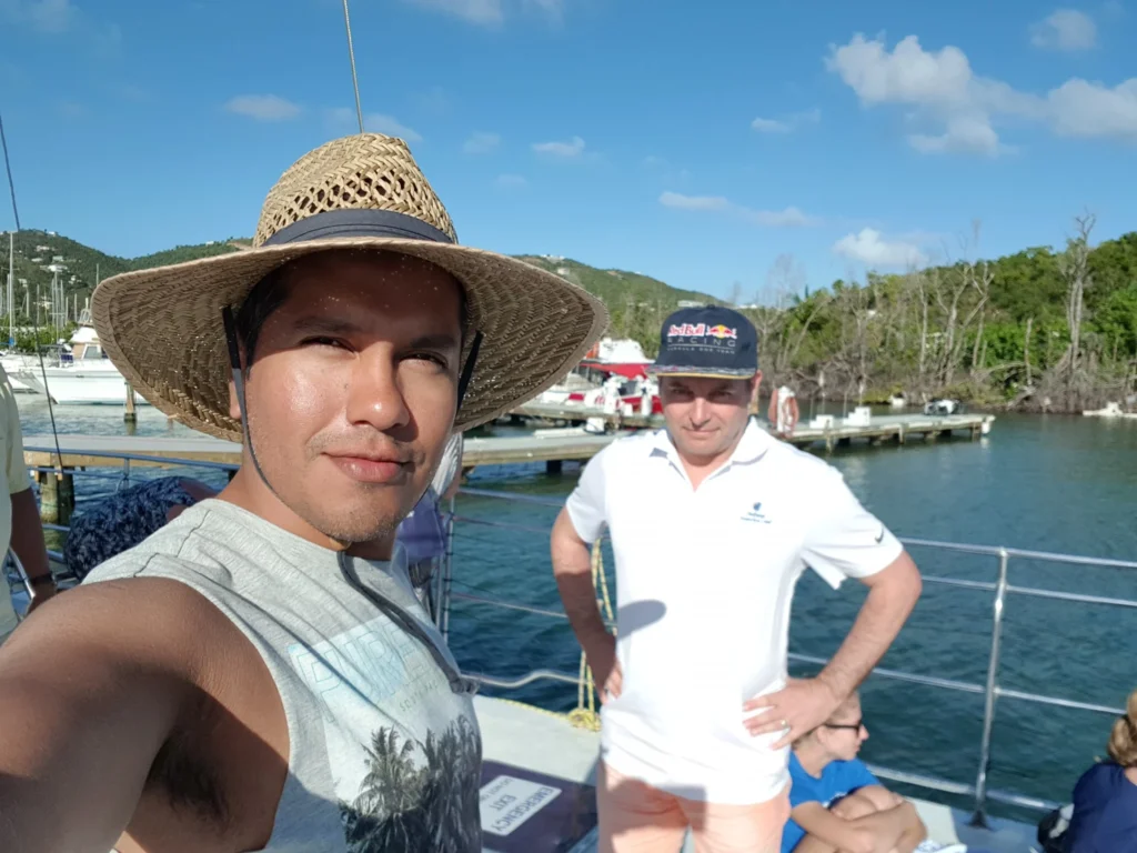 Cruising with Danny and Peter, Holland America Line, Zuiderdam, Charlotte Amalie, US Virgin Islands | A scenic view of a luxury catamaran sailing in the tranquil Caribbean waters near Charlotte Amalie, showcasing stunning landscapes of the U.S. Virgin Islands, vibrant marine life during snorkeling excursions, and secluded Caribbean beaches ideal for exploration.