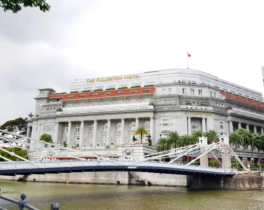 Cruising with Danny and Peter, Holland America Line, Westerdam, Singapore | Singapore bike tour through vibrant cityscapes with historic Chinatown and modern Orchard Road, ending with the Marina Bay water and light show featuring the Marina Bay Sands light display and stunning fountain show.
