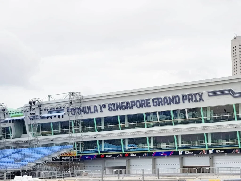 Cruising with Danny and Peter, Holland America Line, Westerdam, Singapore | Singapore bike tour through vibrant cityscapes with historic Chinatown and modern Orchard Road, ending with the Marina Bay water and light show featuring the Marina Bay Sands light display and stunning fountain show.