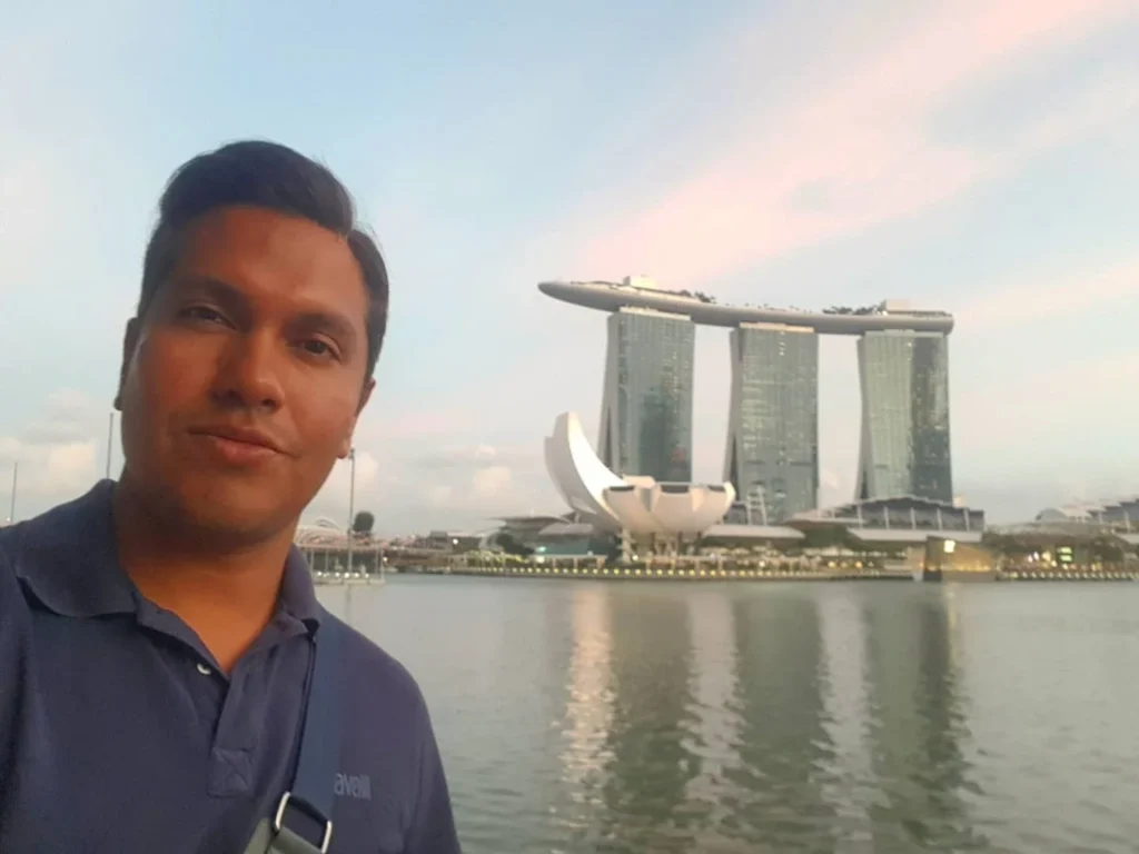 Cruising with Danny and Peter, Holland America Line, Westerdam, Singapore | Singapore bike tour through vibrant cityscapes with historic Chinatown and modern Orchard Road, ending with the Marina Bay water and light show featuring the Marina Bay Sands light display and stunning fountain show.