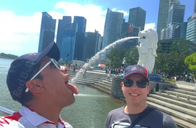 Discovering Singapore: An Unforgettable Journey Through Iconic Landmarks and Culinary Delights 9 Cruising with Danny and Peter, Holland America Line, Westerdam, Singapore | Singapore Travel Highlights featuring the iconic Merlion Statue, vibrant Chinatown Experience with bustling markets and temples, and a scenic Singapore Skyline Dinner with fresh seafood dining.