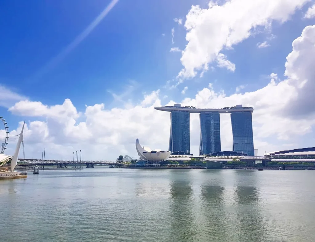Cruising with Danny and Peter, Holland America Line, Westerdam, Singapore | Singapore Travel Highlights featuring the iconic Merlion Statue, vibrant Chinatown Experience with bustling markets and temples, and a scenic Singapore Skyline Dinner with fresh seafood dining.