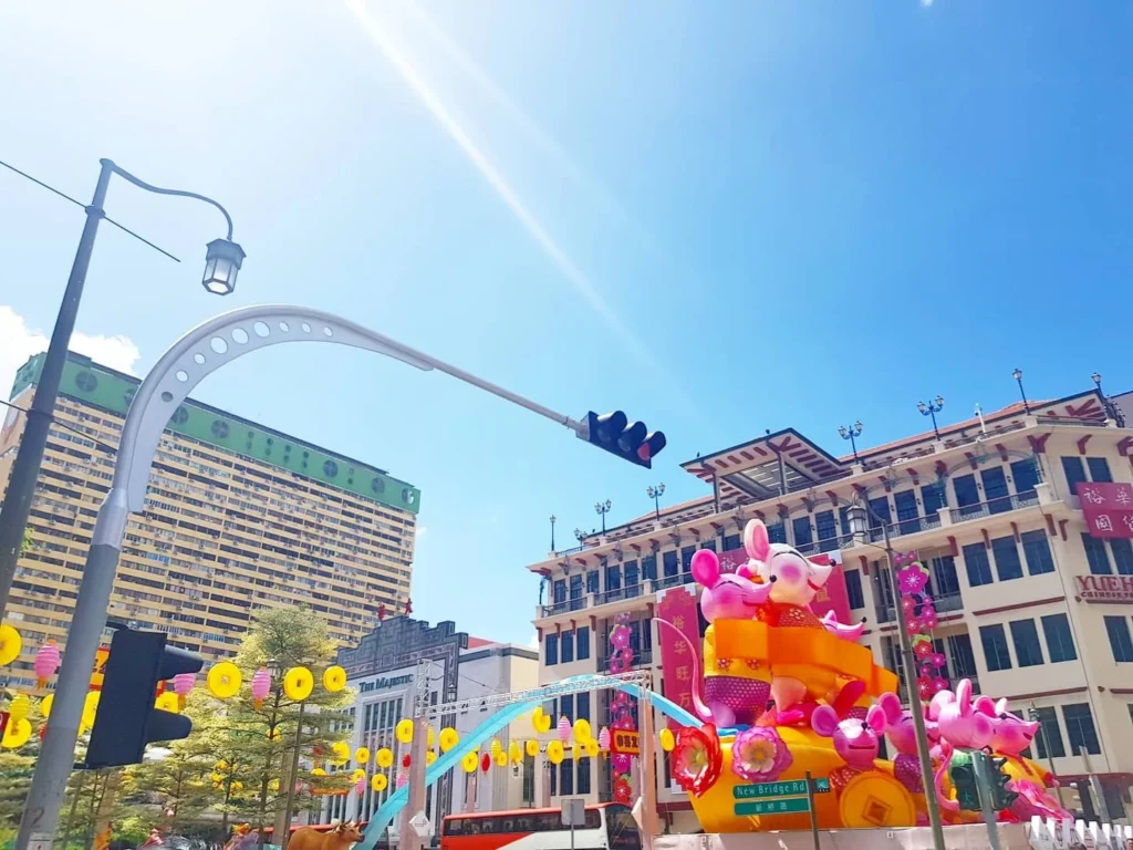 Cruising with Danny and Peter, Holland America Line, Westerdam, Singapore | Singapore Travel Highlights featuring the iconic Merlion Statue, vibrant Chinatown Experience with bustling markets and temples, and a scenic Singapore Skyline Dinner with fresh seafood dining.