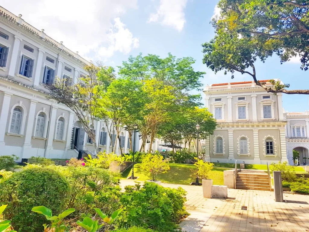 Cruising with Danny and Peter, Holland America Line, Westerdam, Singapore | Singapore Travel Highlights featuring the iconic Merlion Statue, vibrant Chinatown Experience with bustling markets and temples, and a scenic Singapore Skyline Dinner with fresh seafood dining.