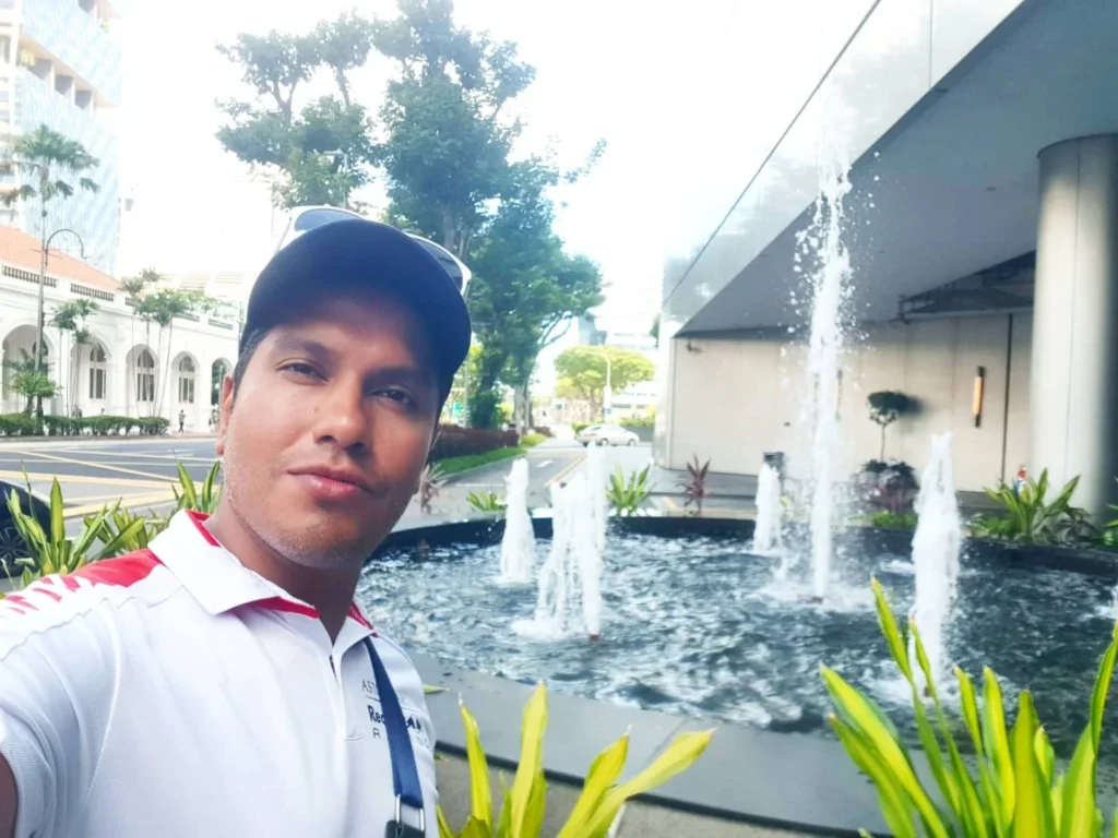 Cruising with Danny and Peter, Holland America Line, Westerdam, Singapore | Singapore Travel Highlights featuring the iconic Merlion Statue, vibrant Chinatown Experience with bustling markets and temples, and a scenic Singapore Skyline Dinner with fresh seafood dining.