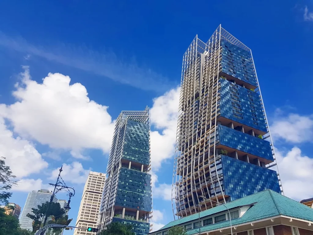 Cruising with Danny and Peter, Holland America Line, Westerdam, Singapore | Singapore Travel Highlights featuring the iconic Merlion Statue, vibrant Chinatown Experience with bustling markets and temples, and a scenic Singapore Skyline Dinner with fresh seafood dining.