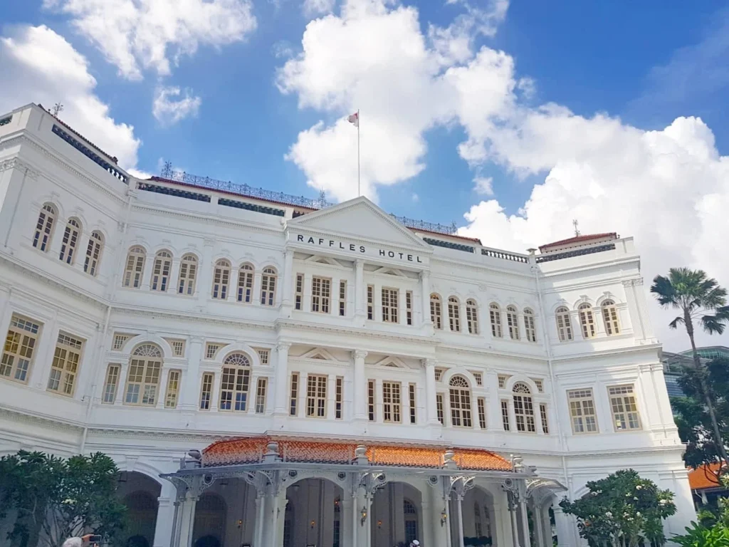 Cruising with Danny and Peter, Holland America Line, Westerdam, Singapore | Singapore Travel Highlights featuring the iconic Merlion Statue, vibrant Chinatown Experience with bustling markets and temples, and a scenic Singapore Skyline Dinner with fresh seafood dining.