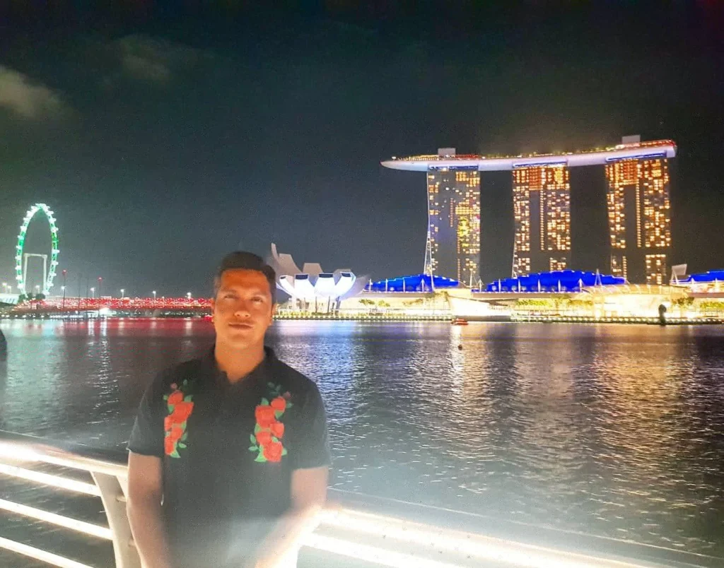 Cruising with Danny and Peter, Holland America Line, Westerdam, Singapore | Singapore Travel Highlights featuring the iconic Merlion Statue, vibrant Chinatown Experience with bustling markets and temples, and a scenic Singapore Skyline Dinner with fresh seafood dining.