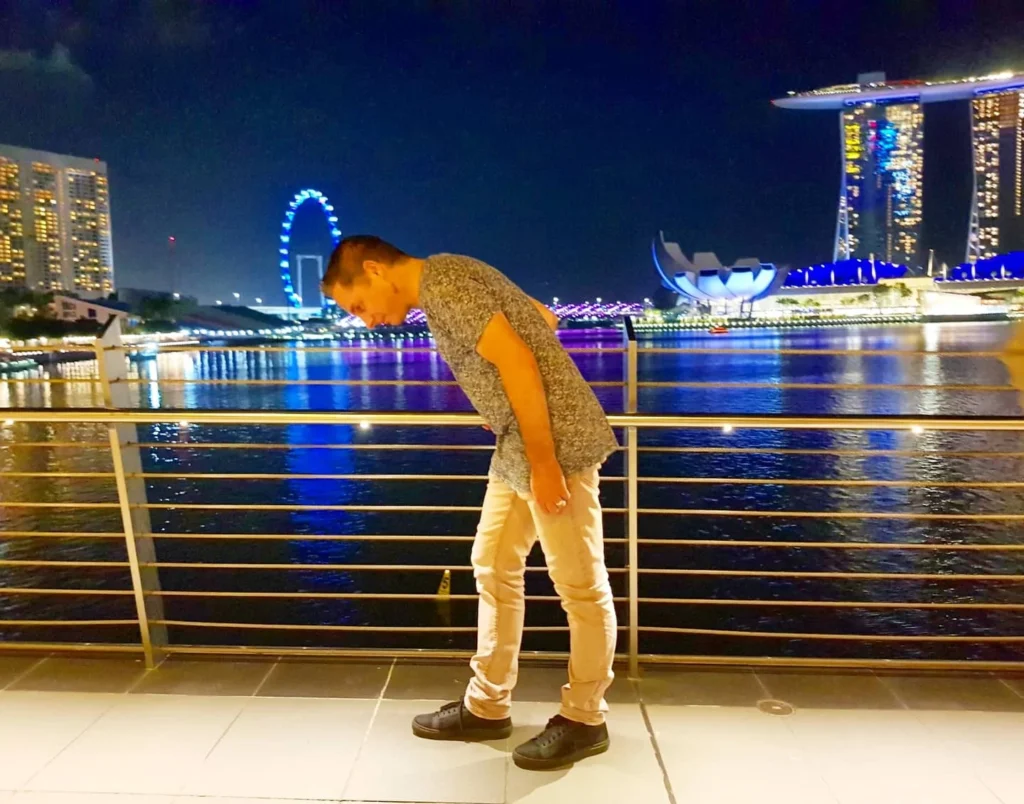 Cruising with Danny and Peter, Holland America Line, Westerdam, Singapore | Singapore Travel Highlights featuring the iconic Merlion Statue, vibrant Chinatown Experience with bustling markets and temples, and a scenic Singapore Skyline Dinner with fresh seafood dining.