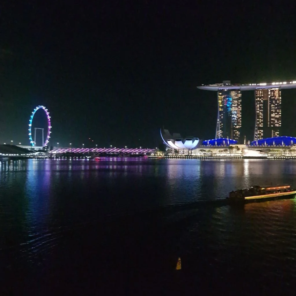 Cruising with Danny and Peter, Holland America Line, Westerdam, Singapore | Singapore Travel Highlights featuring the iconic Merlion Statue, vibrant Chinatown Experience with bustling markets and temples, and a scenic Singapore Skyline Dinner with fresh seafood dining.