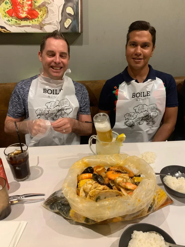 Cruising with Danny and Peter, Holland America Line, Westerdam, Singapore | Singapore Travel Highlights featuring the iconic Merlion Statue, vibrant Chinatown Experience with bustling markets and temples, and a scenic Singapore Skyline Dinner with fresh seafood dining.
