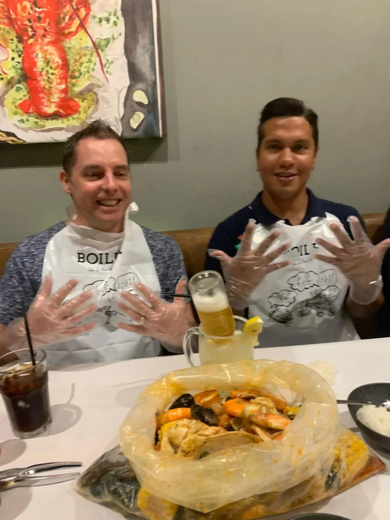 Cruising with Danny and Peter, Holland America Line, Westerdam, Singapore | Singapore Travel Highlights featuring the iconic Merlion Statue, vibrant Chinatown Experience with bustling markets and temples, and a scenic Singapore Skyline Dinner with fresh seafood dining.