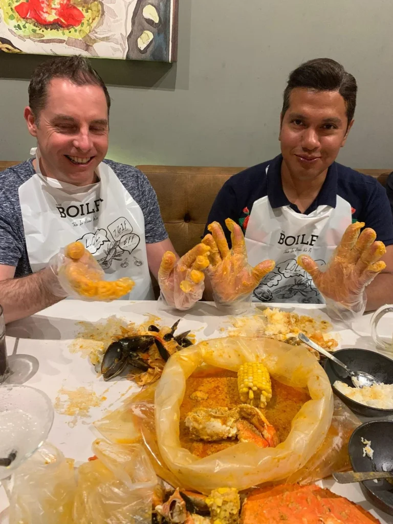 Cruising with Danny and Peter, Holland America Line, Westerdam, Singapore | Singapore Travel Highlights featuring the iconic Merlion Statue, vibrant Chinatown Experience with bustling markets and temples, and a scenic Singapore Skyline Dinner with fresh seafood dining.