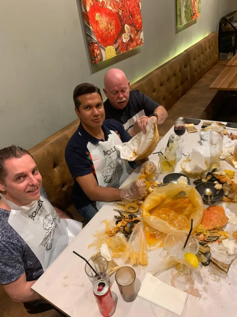 Cruising with Danny and Peter, Holland America Line, Westerdam, Singapore | Singapore Travel Highlights featuring the iconic Merlion Statue, vibrant Chinatown Experience with bustling markets and temples, and a scenic Singapore Skyline Dinner with fresh seafood dining.