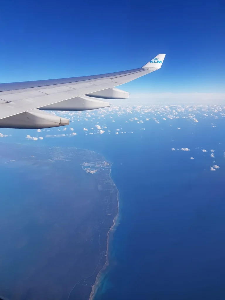 Cruising with Danny and Peter, Holland America Line, Nieuw Amsterdam, Fort Lauderdale, Florida, United States | A stunning view of a Holland America Caribbean Cruise ship sailing through crystal-clear waters, surrounded by tropical islands, showcasing vibrant sunsets, luxury amenities, and unforgettable seaside escapes, perfect for island hopping and cultural exploration.