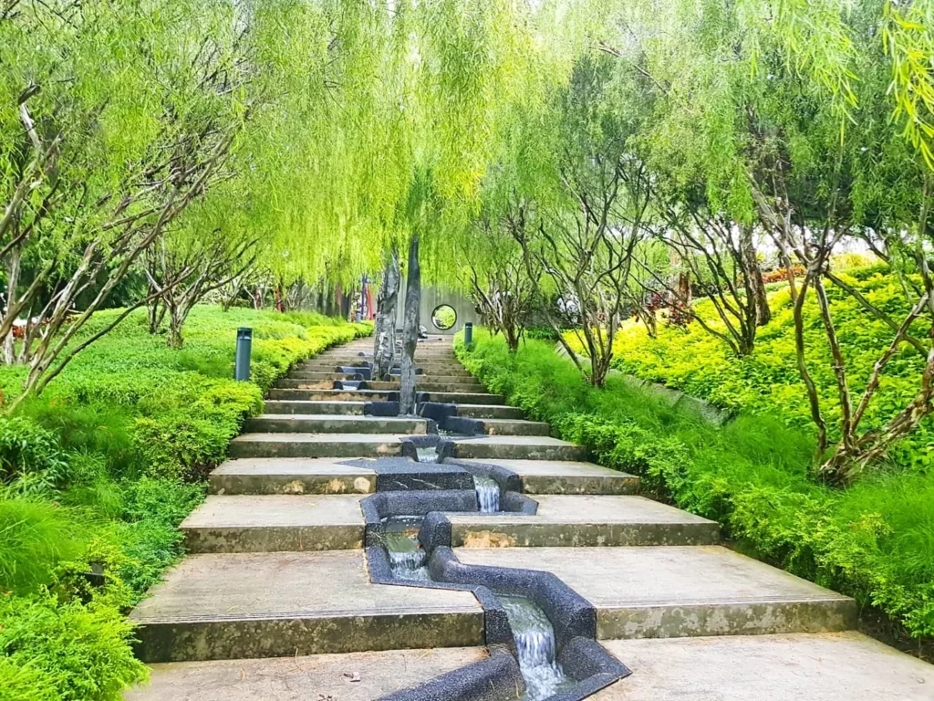 Cruising with Dannay and Peter, Holland America Line, Westerdam, Singapore | Image of Gardens by the Bay's Supertree Grove, Flower Dome Singapore, Cloud Forest Dome, and Changi Airport Jewel with Rain Vortex showcasing Singapore Gardens highlights.