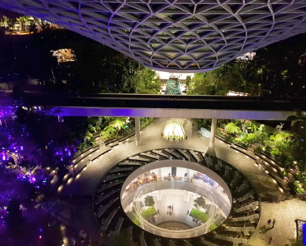 Cruising with Dannay and Peter, Holland America Line, Westerdam, Singapore | Image of Gardens by the Bay's Supertree Grove, Flower Dome Singapore, Cloud Forest Dome, and Changi Airport Jewel with Rain Vortex showcasing Singapore Gardens highlights.