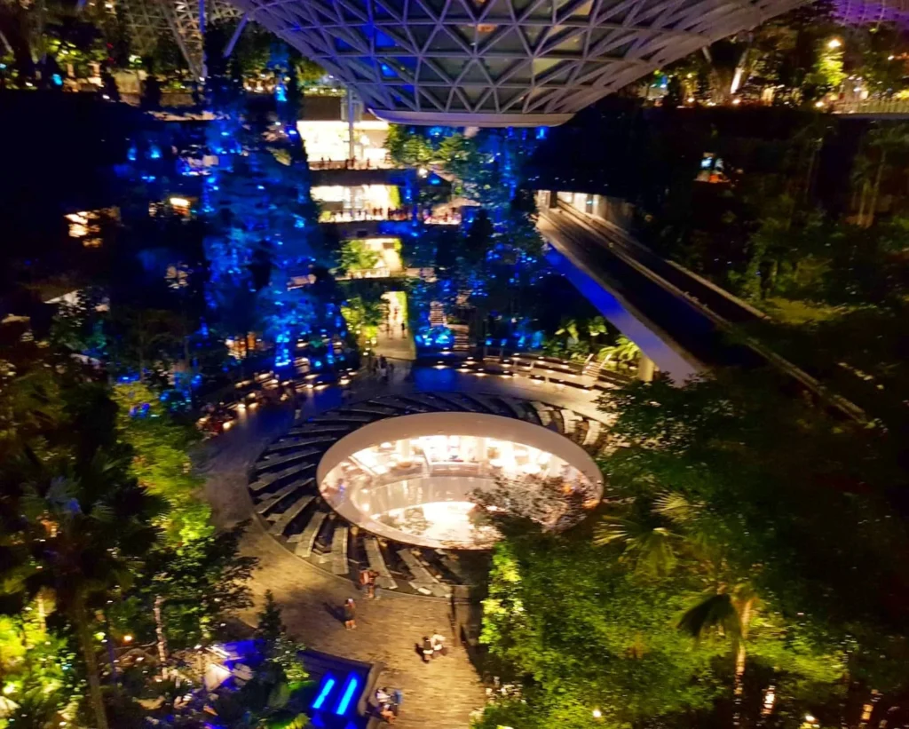 Cruising with Dannay and Peter, Holland America Line, Westerdam, Singapore | Image of Gardens by the Bay's Supertree Grove, Flower Dome Singapore, Cloud Forest Dome, and Changi Airport Jewel with Rain Vortex showcasing Singapore Gardens highlights.