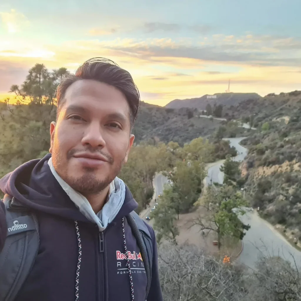 Cruising with Danny and Peter, Holland America Line, Koningsdam, Los Angeles, California, United States | A stunning panoramic view from the Hollywood Hills walk, showcasing the sprawling city of Los Angeles below, vibrant greenery along the hiking trails, and friends enjoying an inspiring nature walk in this iconic landscape.