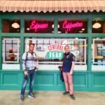 Cruising with Danny and Peter, Holland America Line, Koningsdam, Los Angeles, California, United States | Hollywood Day Trip highlights: A steaming plate of sizzling bacon and freshly brewed coffee sets the stage for an exciting day exploring Los Angeles. Iconic landmarks like the Warner Bros Studio, showcasing Central Perk from Friends and Hogwarts from Harry Potter, bring movie magic to life. The glimmering Hollywood Walk of Fame features brass stars of legends like Marilyn Monroe, captured in crowd-free morning photos along bustling Hollywood Boulevard. The majestic Dolby Theatre dazzles with its Oscar stage and rich stories of Hollywood royalty. The famous Hollywood Sign stands tall against panoramic views of LA, offering a perfect photo backdrop, especially at sunset. Sunset Boulevard pulses with life, trendy cafés, and vibrant local flavors, culminating in a relaxing al fresco dinner under warm California skies. This cinematic adventure encapsulates the glamour, history, and charm of a quintessential Tinseltown experience.