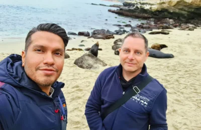 A Nostalgic 1950s American Diner Experience and a Scenic California Train Journey 5 Cruising with Danny and Peter, Holland America Line, Koningsdam, San Diego, California, United States | A nostalgic 1950s American breakfast in a retro diner with vintage decor, featuring classic pancakes and bacon, paired with a scenic California train journey along the Pacific Ocean, offering breathtaking coastal views and a mid-century dining experience. Enjoy the charm of a throwback dining adventure, starting in Los Angeles and traveling to San Diego, with retro food and decor complementing the scenic travel experience.