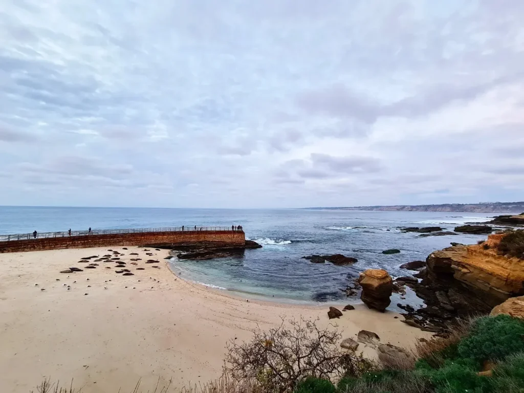 Cruising with Danny and Peter, Holland America Line, Koningsdam, San Diego, California, United States | A nostalgic 1950s American breakfast in a retro diner with vintage decor, featuring classic pancakes and bacon, paired with a scenic California train journey along the Pacific Ocean, offering breathtaking coastal views and a mid-century dining experience. Enjoy the charm of a throwback dining adventure, starting in Los Angeles and traveling to San Diego, with retro food and decor complementing the scenic travel experience.