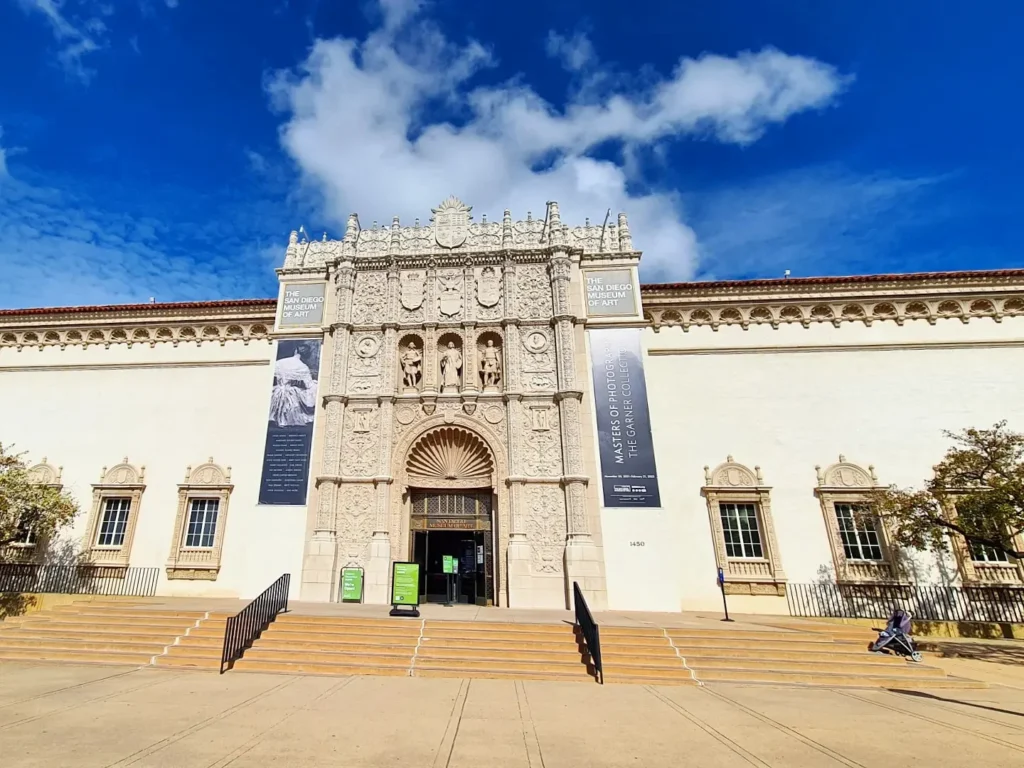 Cruising with Danny and Peter, Holland America Line, Koningsdam, San Diego, California, United States | A vibrant scene from our San Diego Food Tour, featuring a delicious plate of huevos rancheros at a charming Little Italy café, lush gardens and Spanish-influenced architecture in Balboa Park, the imposing USS Midway aircraft carrier museum, and an evening spread of flavorful Mexican dishes, capturing the essence of a Cultural and Culinary Exploration in San Diego.