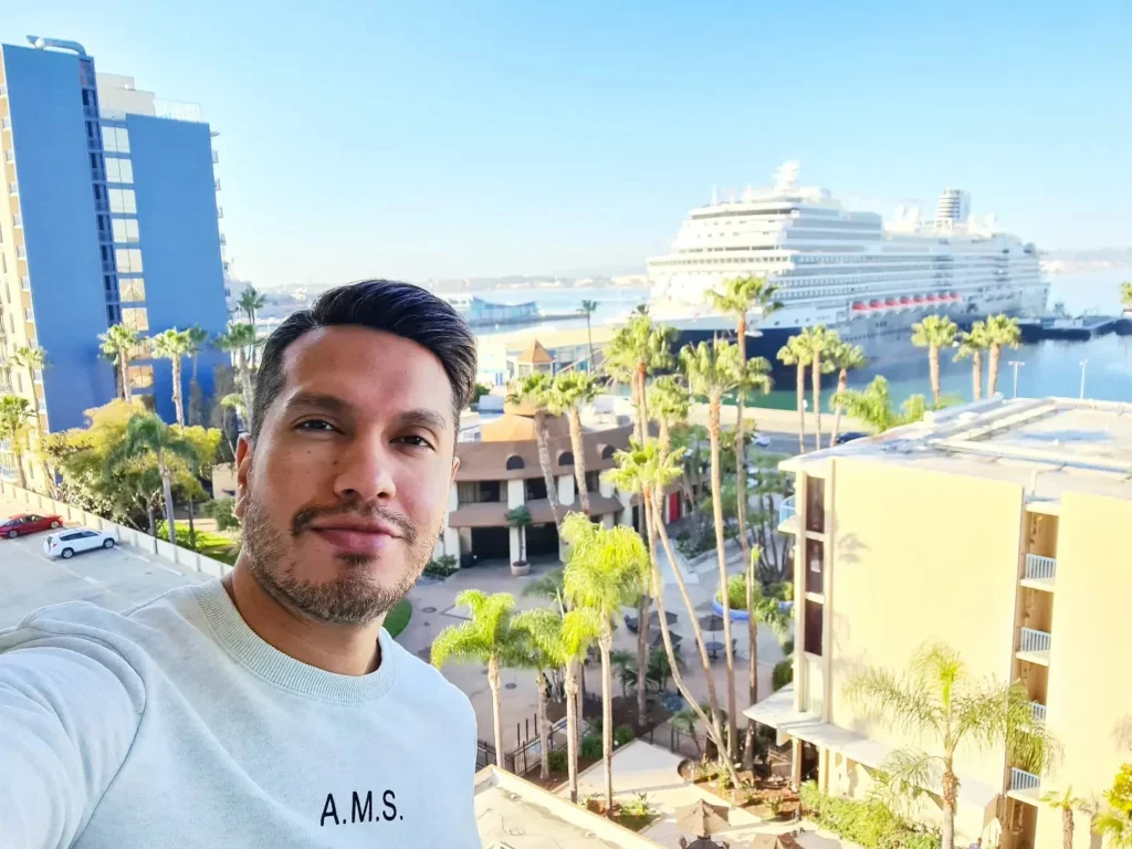 Cruising with Danny and Peter, Holland America Line, Koningsdam, San Diego, California, United States | Guests enjoying a seamless Cruise Embarkation Day with a special Birthday Celebration on Cruise Ship, featuring a warm welcome, joyful moments, and a festive atmosphere on the deck.