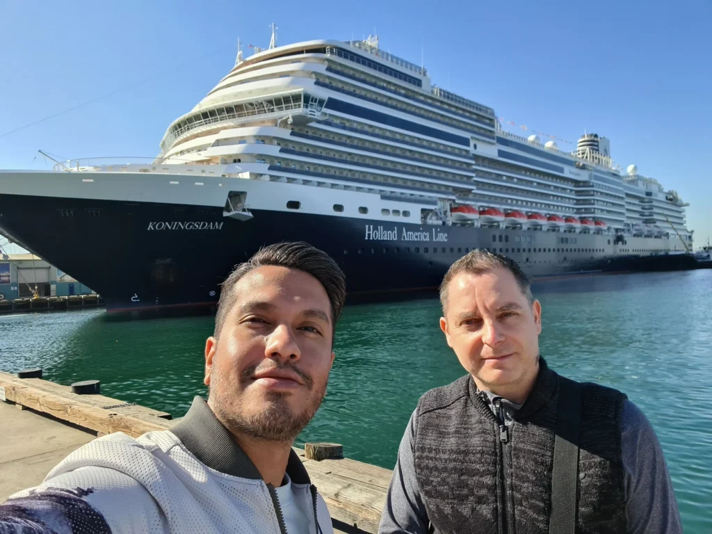 Cruising with Danny and Peter, Holland America Line, Koningsdam, San Diego, California, United States | Guests enjoying a seamless Cruise Embarkation Day with a special Birthday Celebration on Cruise Ship, featuring a warm welcome, joyful moments, and a festive atmosphere on the deck.