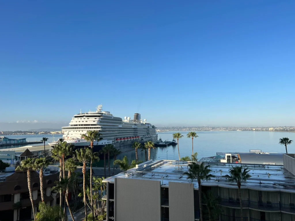 Cruising with Danny and Peter, Holland America Line, Koningsdam, San Diego, California, United States | Guests enjoying a seamless Cruise Embarkation Day with a special Birthday Celebration on Cruise Ship, featuring a warm welcome, joyful moments, and a festive atmosphere on the deck.