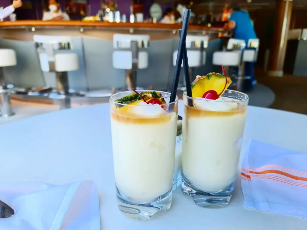 Cruising with Danny and Peter, Holland America Line, Koningsdam, San Diego, California, United States | Guests enjoying a seamless Cruise Embarkation Day with a special Birthday Celebration on Cruise Ship, featuring a warm welcome, joyful moments, and a festive atmosphere on the deck.