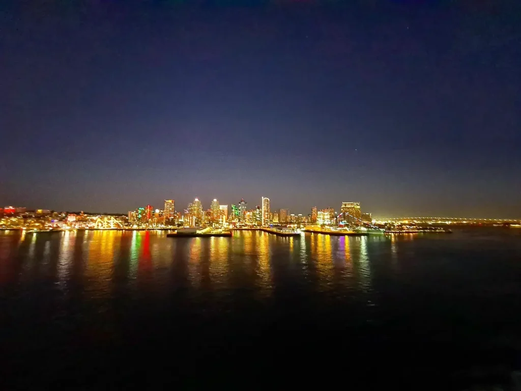 Cruising with Danny and Peter, Holland America Line, Koningsdam, San Diego, California, United States | Guests enjoying a seamless Cruise Embarkation Day with a special Birthday Celebration on Cruise Ship, featuring a warm welcome, joyful moments, and a festive atmosphere on the deck.