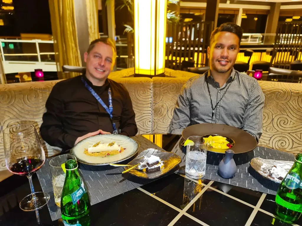 Cruising with Danny and Peter, Holland America Line, Koningsdam, San Diego, California, United States | Guests enjoying a seamless Cruise Embarkation Day with a special Birthday Celebration on Cruise Ship, featuring a warm welcome, joyful moments, and a festive atmosphere on the deck.