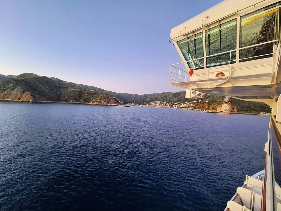 Cruising with Danny and Peter, Holland America Line, Koningsdam, Avalon, California, United States | Scenic Avalon Biking Adventures showcasing coastal views, cyclists on charming trails, Wrigley Memorial Gardens, and Catalina Island landscapes on an island biking tour.