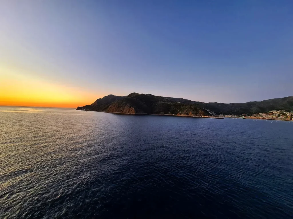 Cruising with Danny and Peter, Holland America Line, Koningsdam, Avalon, California, United States | Scenic Avalon Biking Adventures showcasing coastal views, cyclists on charming trails, Wrigley Memorial Gardens, and Catalina Island landscapes on an island biking tour.