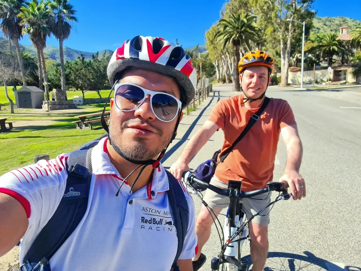 Cruising with Danny and Peter, Holland America Line, Koningsdam, Avalon, California, United States | Scenic Avalon Biking Adventures showcasing coastal views, cyclists on charming trails, Wrigley Memorial Gardens, and Catalina Island landscapes on an island biking tour.