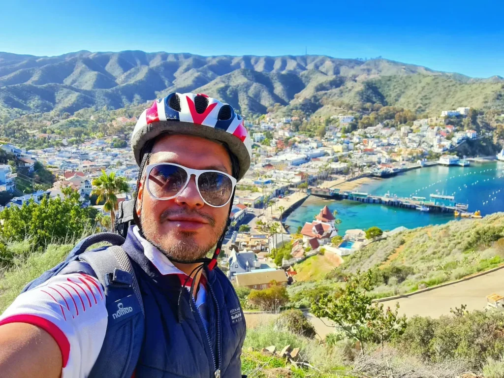 Cruising with Danny and Peter, Holland America Line, Koningsdam, Avalon, California, United States | Scenic Avalon Biking Adventures showcasing coastal views, cyclists on charming trails, Wrigley Memorial Gardens, and Catalina Island landscapes on an island biking tour.