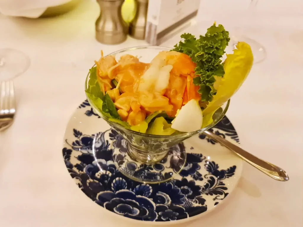 Cruising with Danny and Peter, Holland America Line, Koningsdam, Avalon, California, United States | Scenic Avalon Biking Adventures showcasing coastal views, cyclists on charming trails, Wrigley Memorial Gardens, and Catalina Island landscapes on an island biking tour.