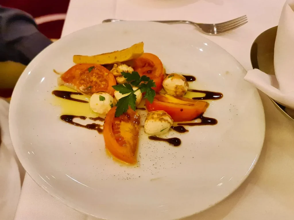 Cruising with Danny and Peter, Holland America Line, Koningsdam, Avalon, California, United States | Scenic Avalon Biking Adventures showcasing coastal views, cyclists on charming trails, Wrigley Memorial Gardens, and Catalina Island landscapes on an island biking tour.